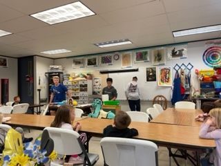 Jr. High art students had a blast and practiced leadership skills as they taught and assisted elementary students with Thanksgiving projects.